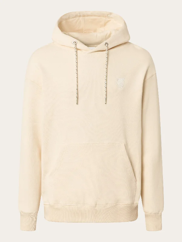 Loose fit hood kangaroo pocket sweat with embroidery at chest - Buttercream Masculine Men's Thick